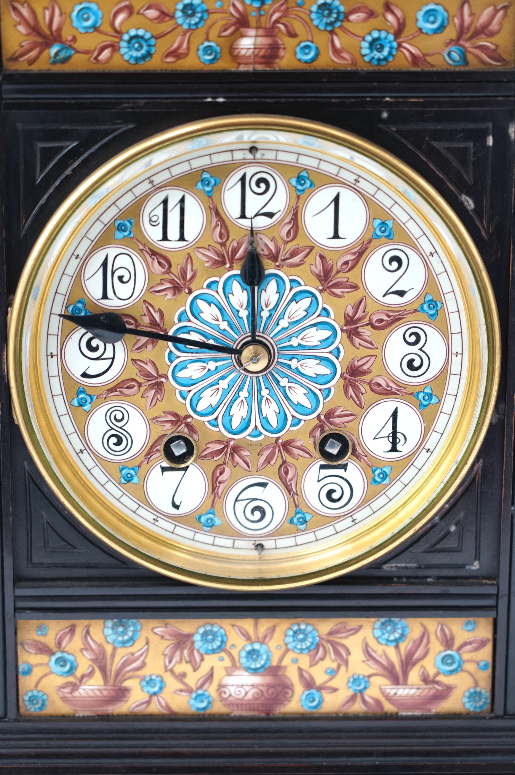 A Victorian Aesthetic Movement ebonised architectural mantel clock, probably designed by Lewis Foreman Day